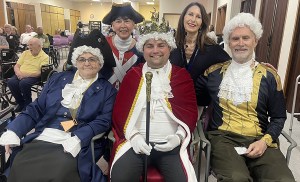 Residents and staff of a Carmelite Sisters community dress up to celebrate America’s 250th anniversary.
