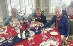 Residents get dressed up for a celebratory meal for the 250th Anniversary of America.