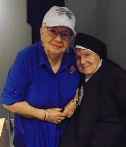 Carmelite Sister and staff pose.